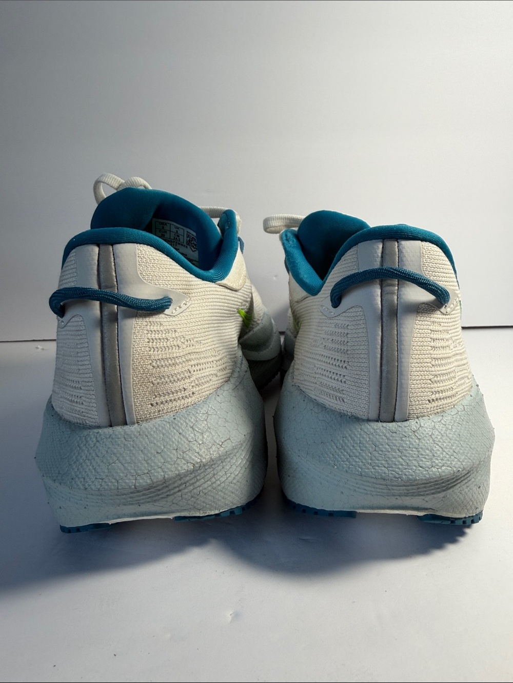 Saucony White Running Shoes with Neon Green and Teal Accents - Picture 6 of 9